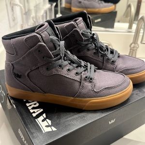 Supra hightop sneakers. Pre-loved. Will fit women’s size 7